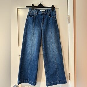 Risen size 26/3 HR wide leg crop pintuck jeans.  5 pocket, zip fly w button